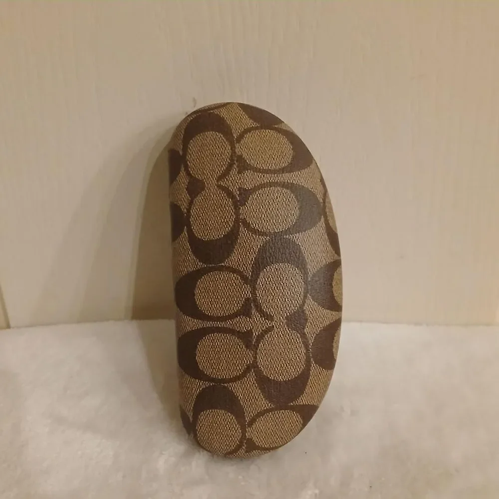 Coach clam-shell hard glasses case in brown and tan signature monogram canvas
